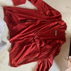 Women’s blazer size XL it is a very pretty brick color